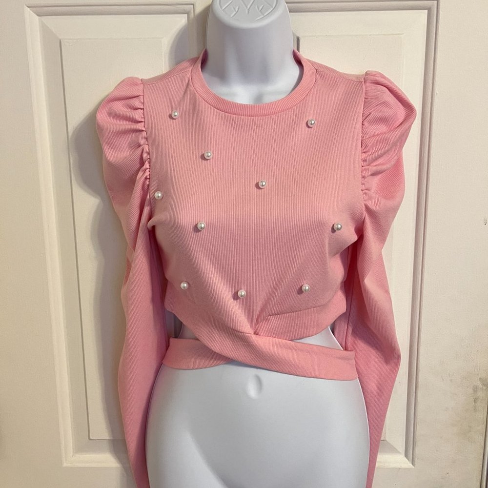 Beautiful light pink long sleeve cut out waist top